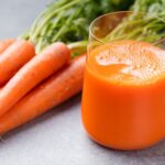 A glass with carrot juice